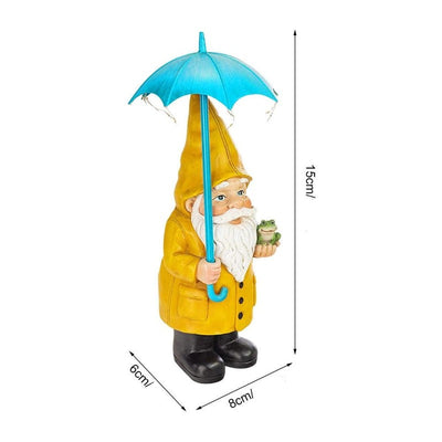 nain de jardin avec un parapluie