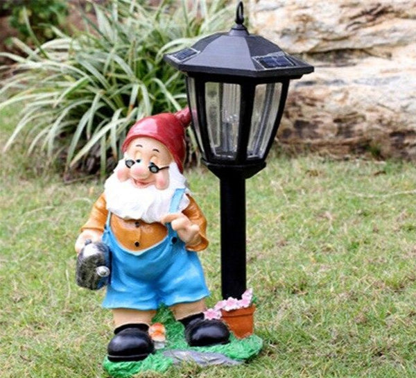 Statue de nain de jardin tenant un champignon - Lampe solaire intégrée -  Décoration pour terrasse, pelouse, cour, nain de jardin : : Jardin